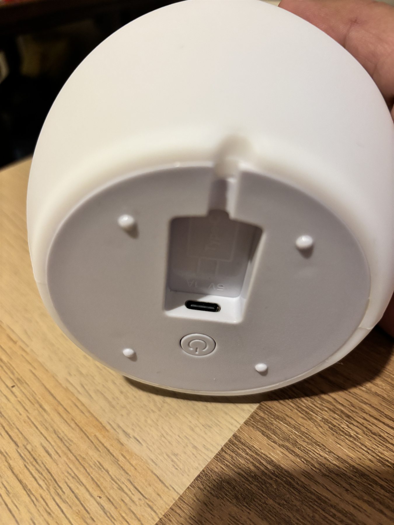 Owlnest Lume bottom-button and USB-C charging detail